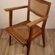Vintage wooden armchair and canning 1950