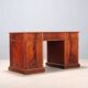 Antique mahogany desk with leather and bronze writing pad, 20th century.