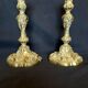 Elegant pair of gilded bronze candlesticks in Louis XV style, 19th century.