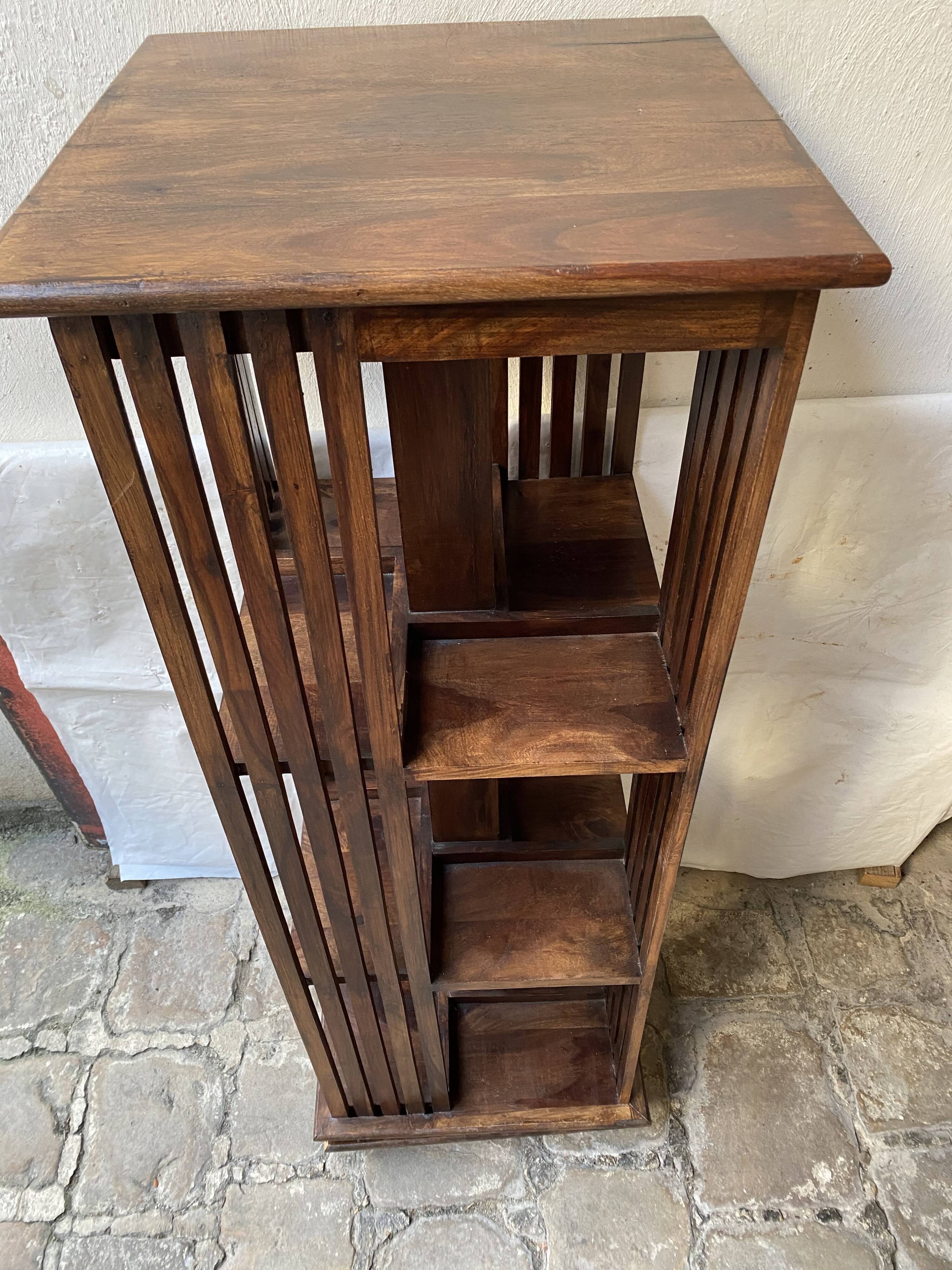 Pivoting column library in mahogany, 20th century.