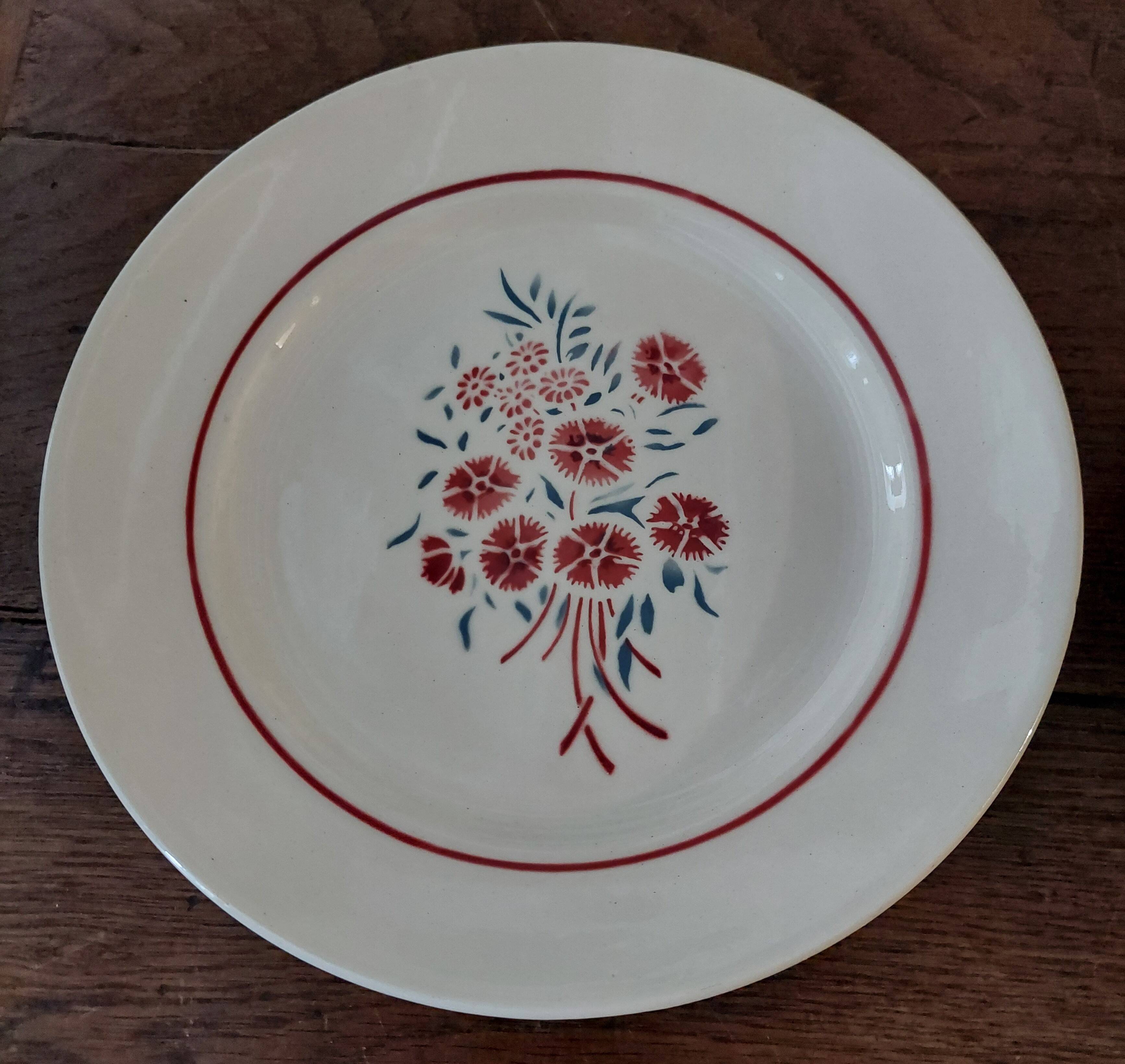 Paire d'assiettes plates faïence terre de fer Badonviller années 1920