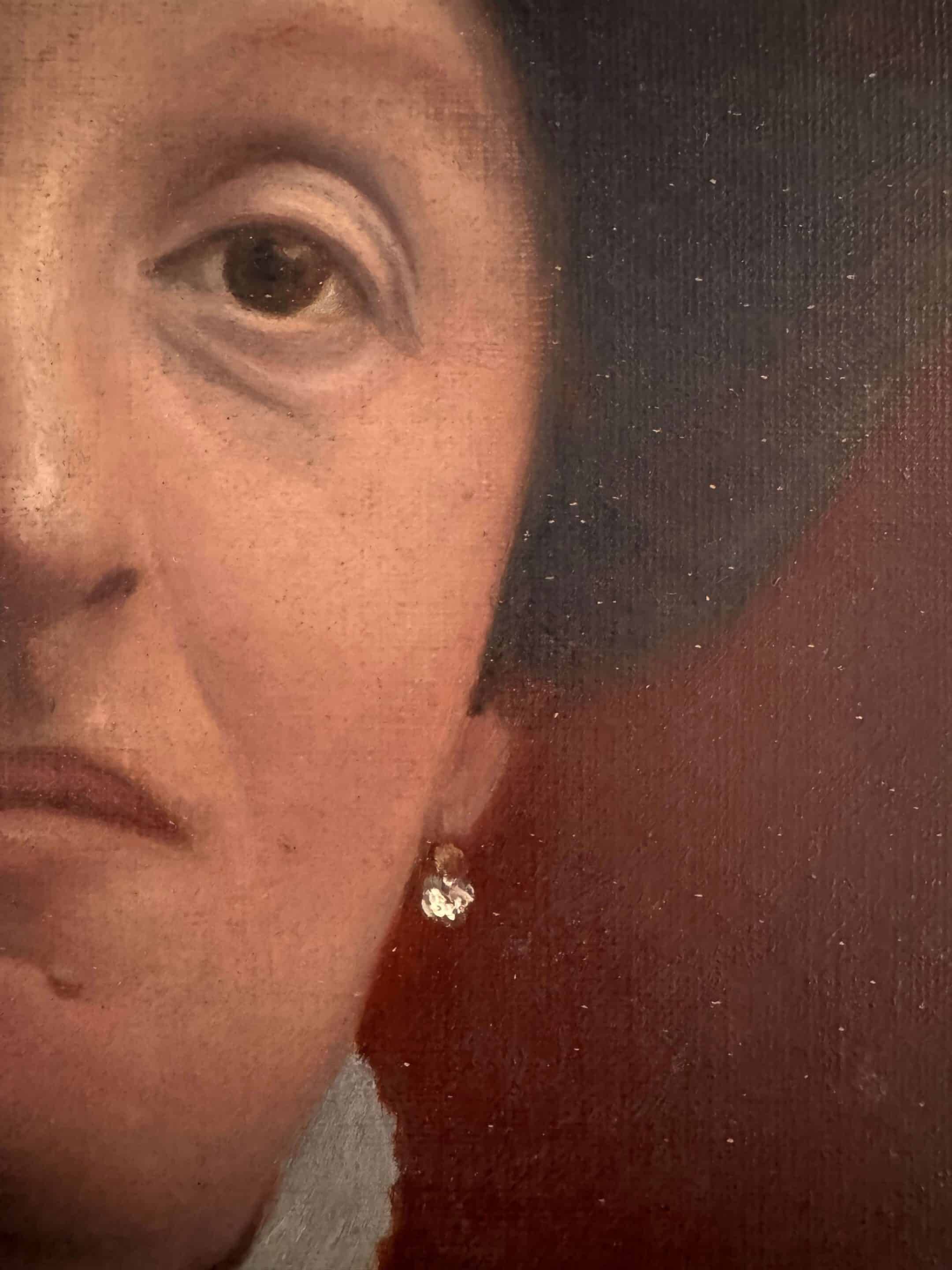 Old painting, portrait of a woman from the early 20th century.