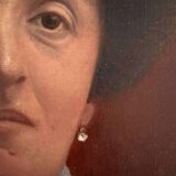 Old painting, portrait of a woman from the early 20th century.