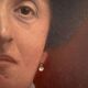 Old painting, portrait of a woman from the early 20th century.