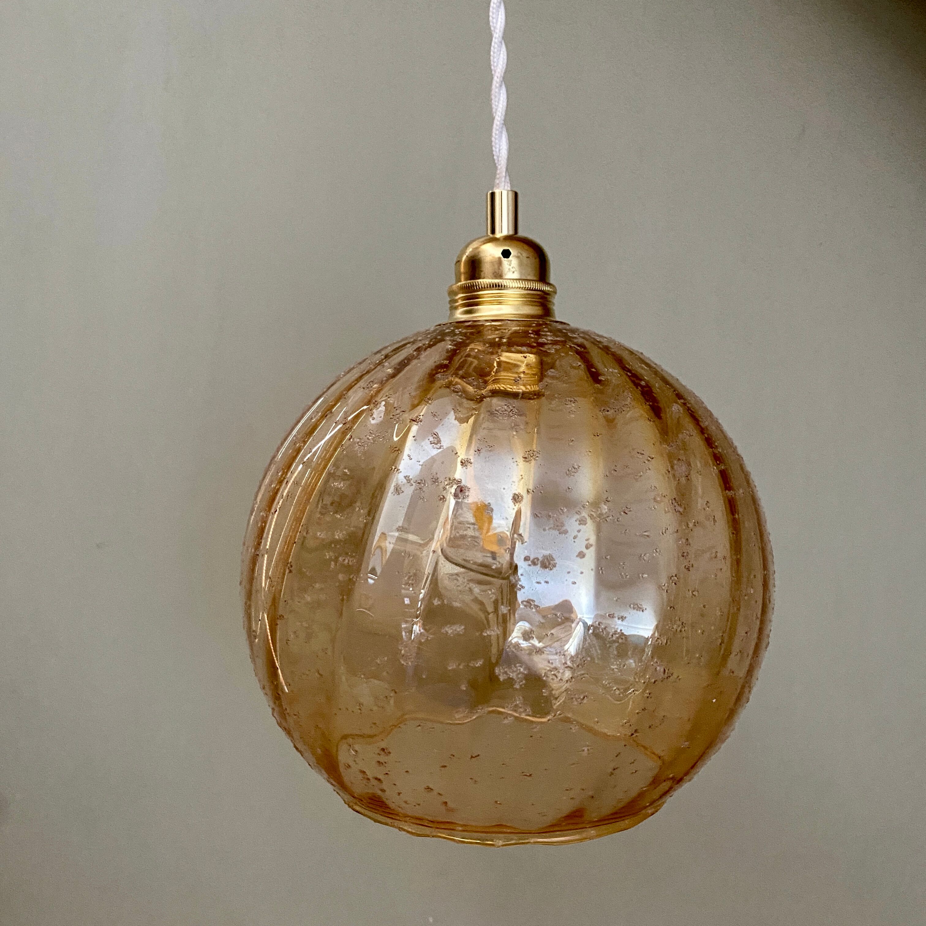 Vintage globe pendant lamp in amber glass