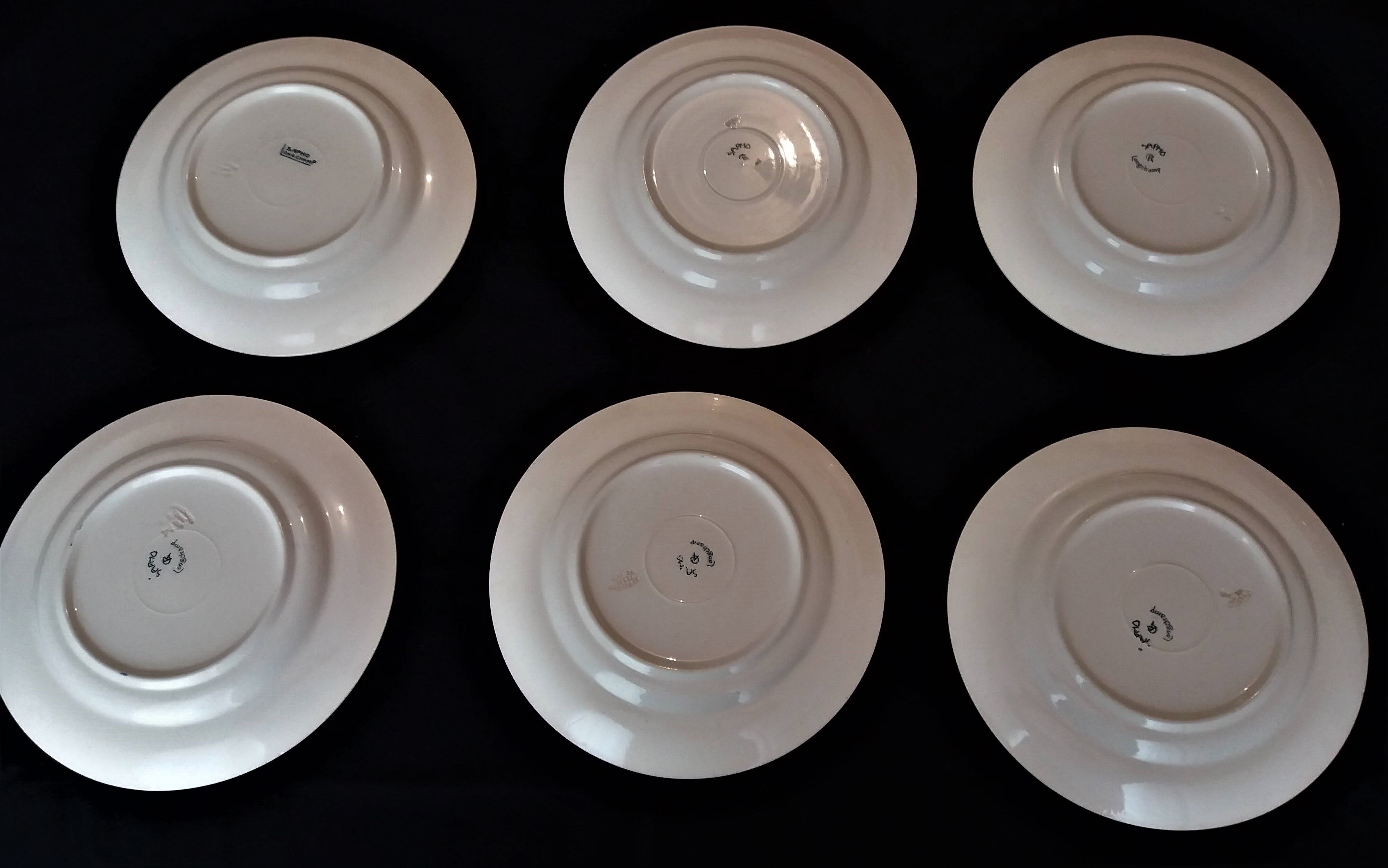 Série de six assiettes plates en faïence de Longchamp modèle Sapho