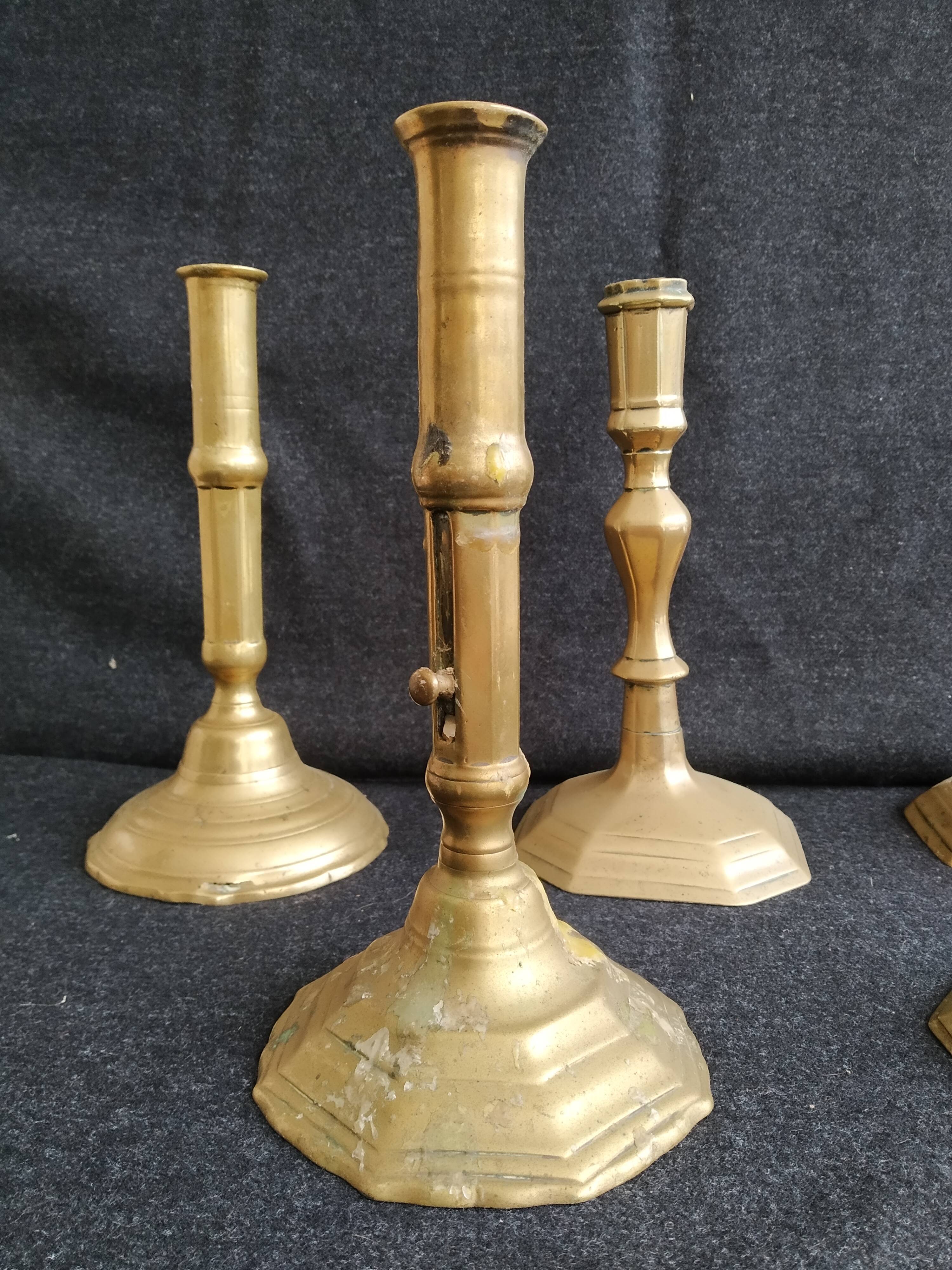Batch of 5 brass candlesticks
