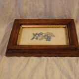 Wooden frame and gilding, laurier linen