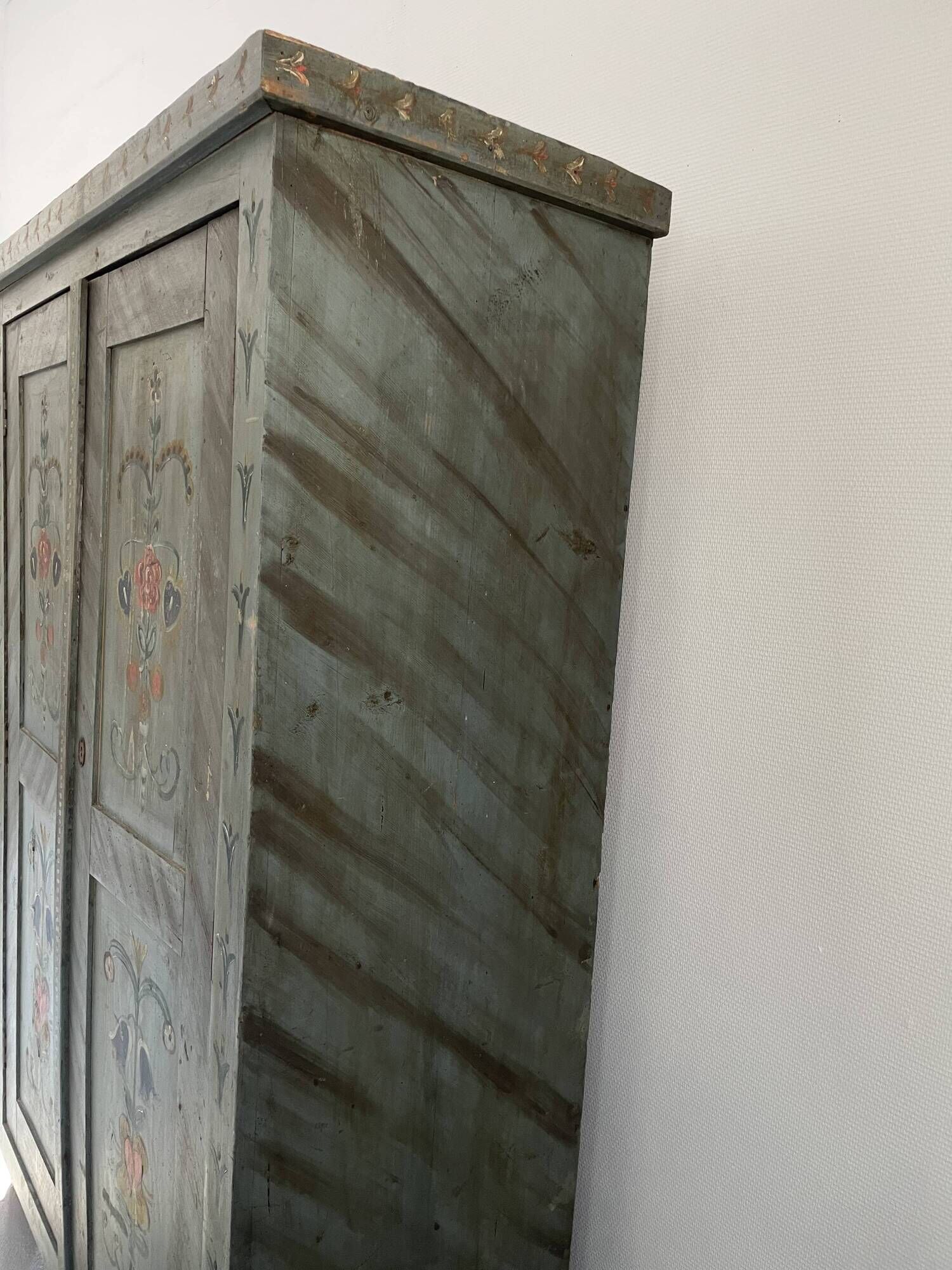 Wedding wardrobe painted in folk art style.