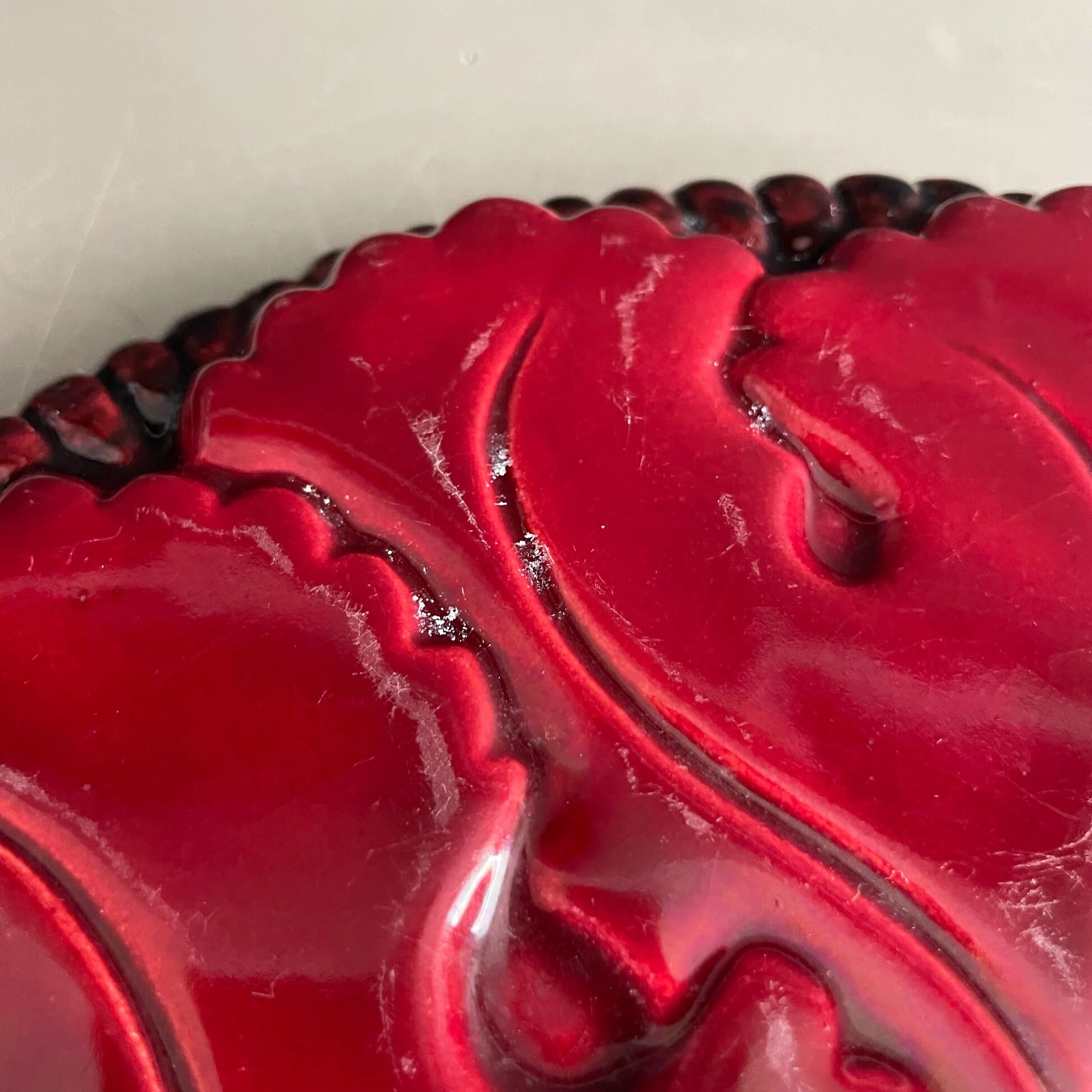 Burgundy ceramic trivet