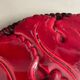 Burgundy ceramic trivet