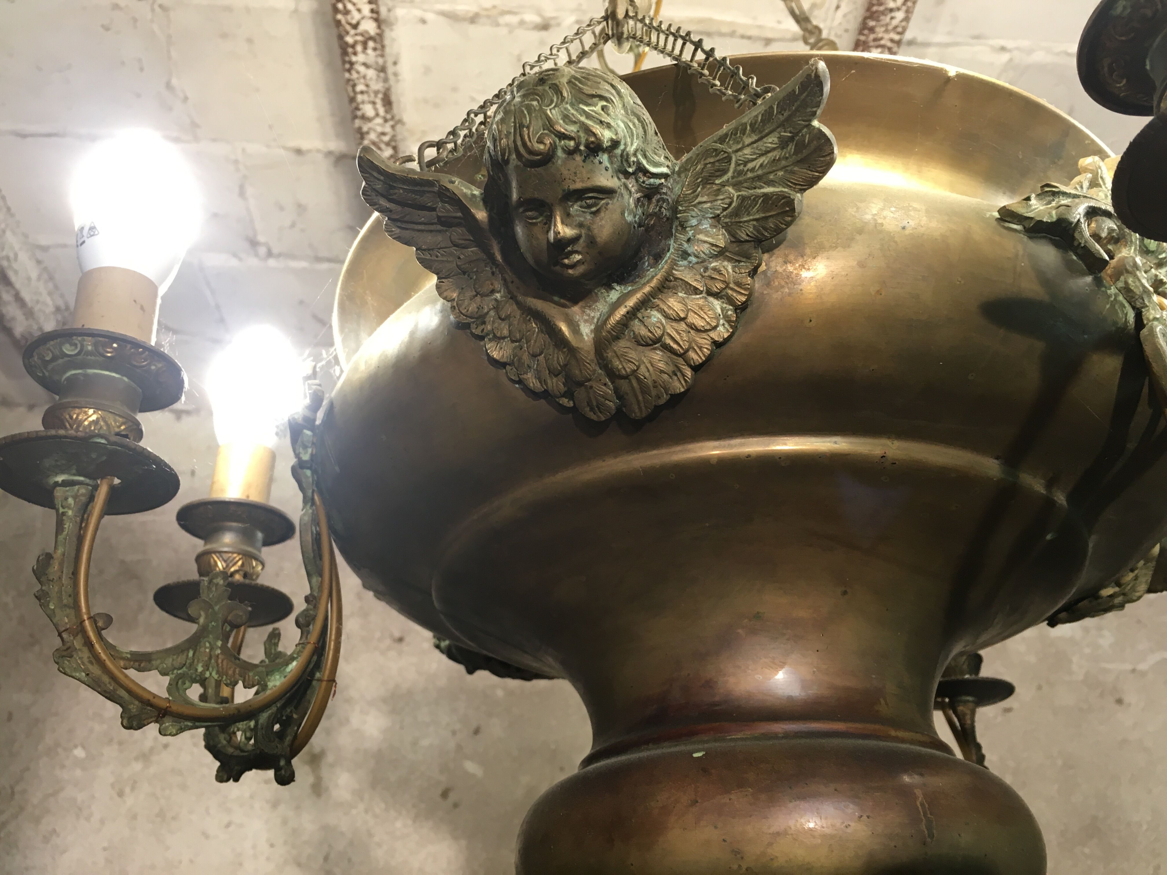 Brass chandelier with angels