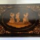 Sorrento marquetry box with a scene of three dancers in a medallion.