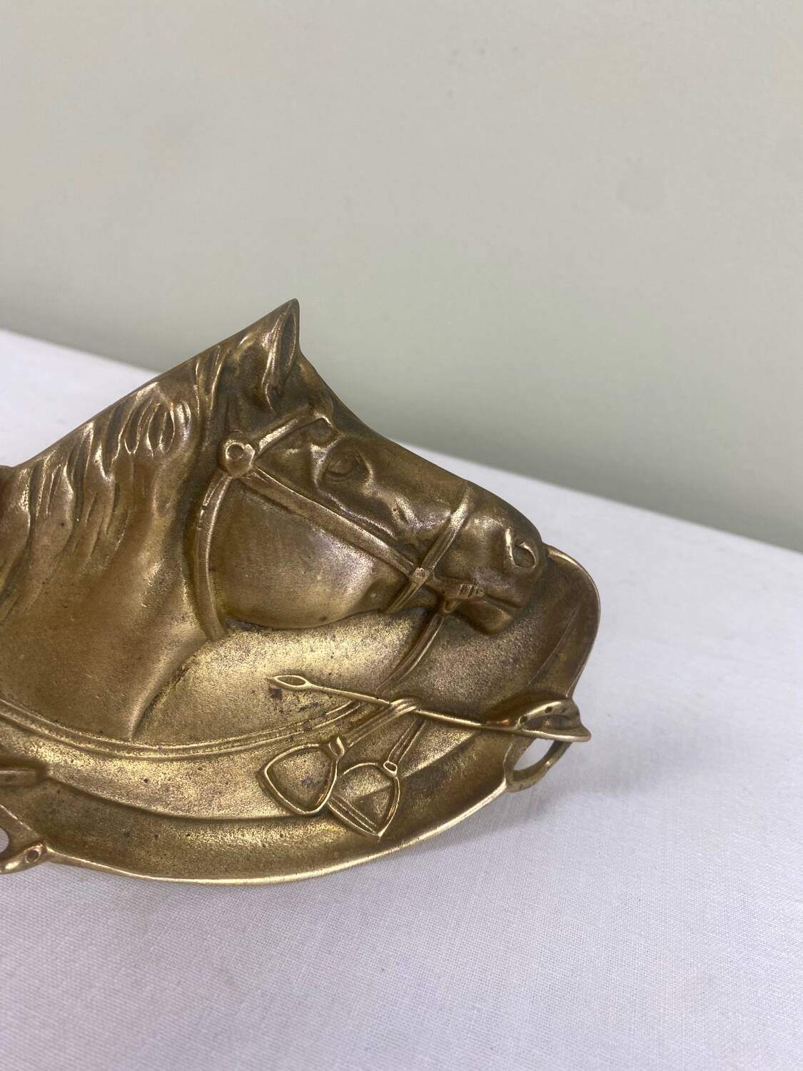 Antique brass pocket emptier