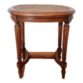 Tabouret de piano en cannage