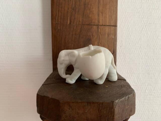 Small elephant in biscuit porcelain, 19th century salt cellars