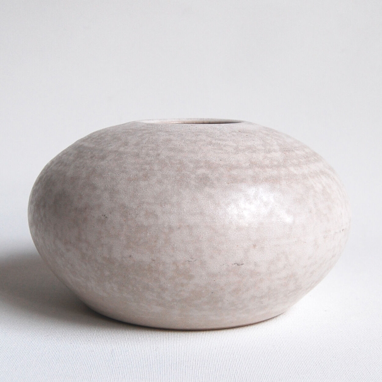 Vintage white ceramic ball vase