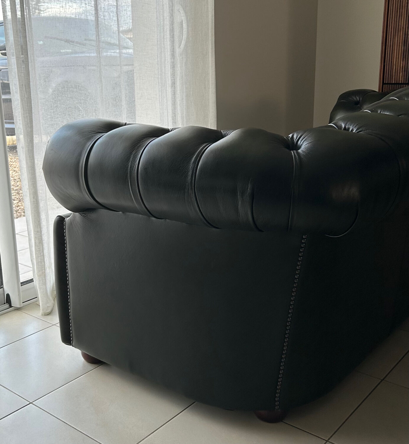 three-seater Chesterfield sofa