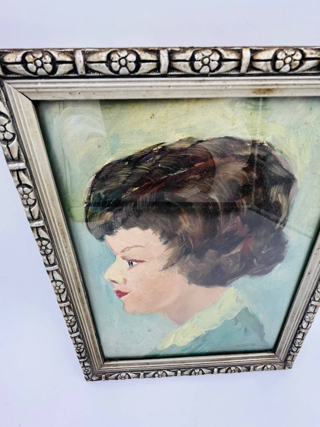 Painting head of a woman signed