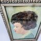 Peinture tête de femme signé