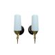 Pair of wall sconces in brass with white glass tulips.