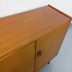 Vintage teak and black metal row from the 60s