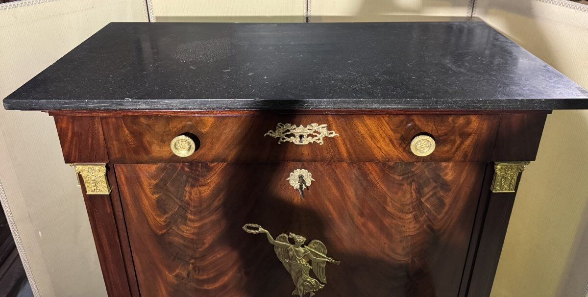 Rare Empire period mahogany secretary with four columns topped with bronze capitals.