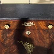 Rare Empire period mahogany secretary with four columns topped with bronze capitals.