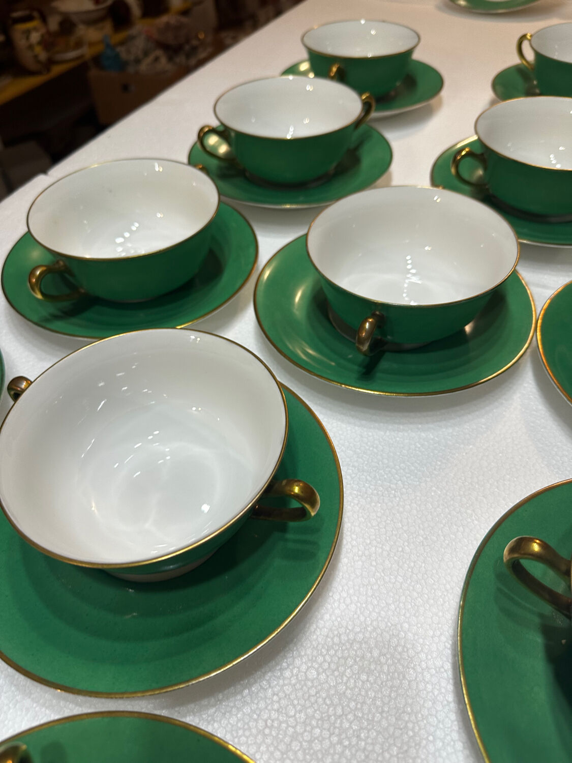 Service 14 cup and saucer in Art Deco Emerald Green and Gold.