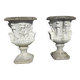 Medical vases with characters in reconstituted stone.