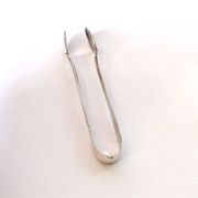 WMF vintage sugar tongs in silver-plated metal with crossed ribbon decoration.