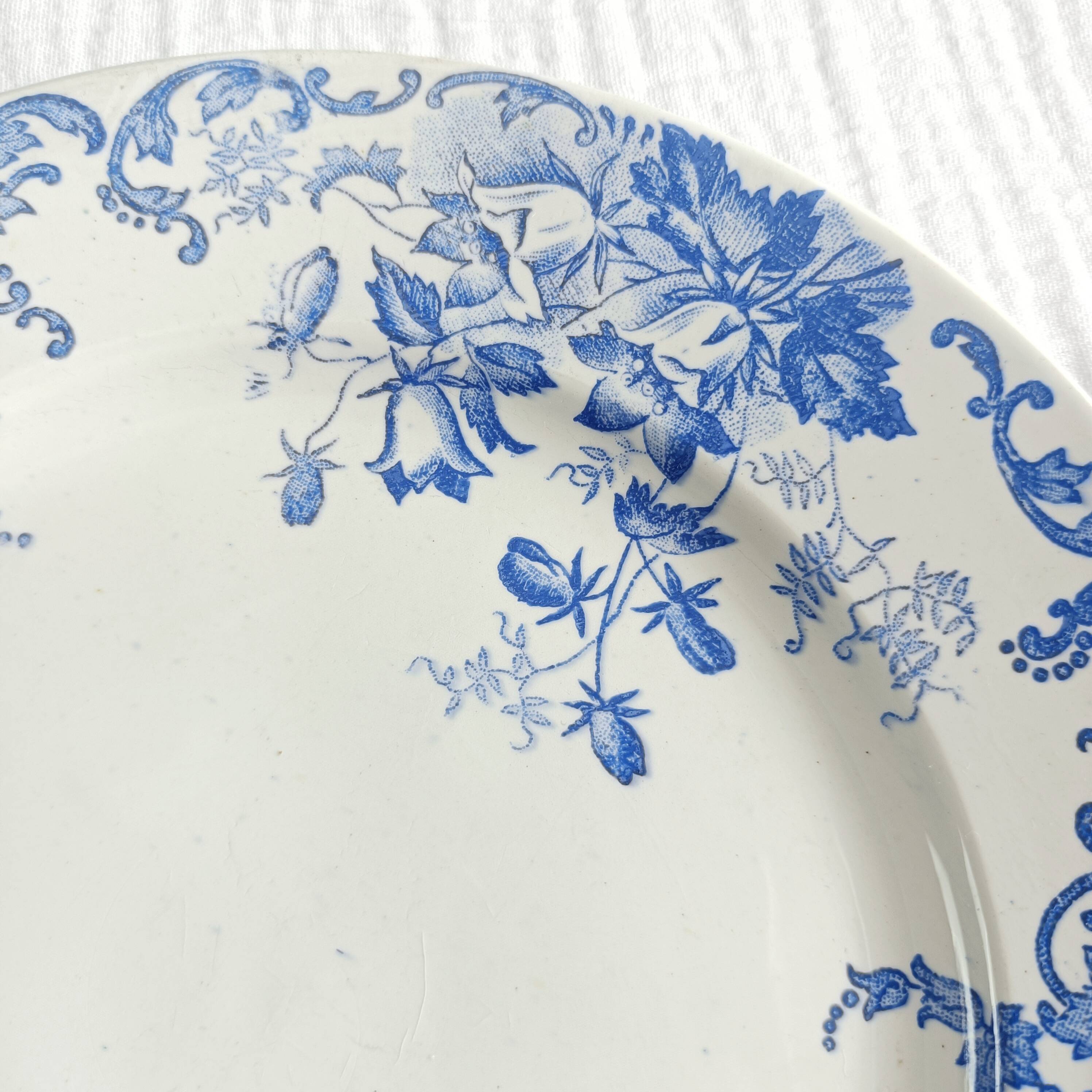 Set of 3 iron earth flat plates Saint Amand et Hamage, Bellflower