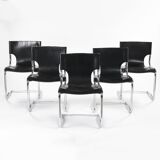 Black leather chairs by Carlo Bartoli