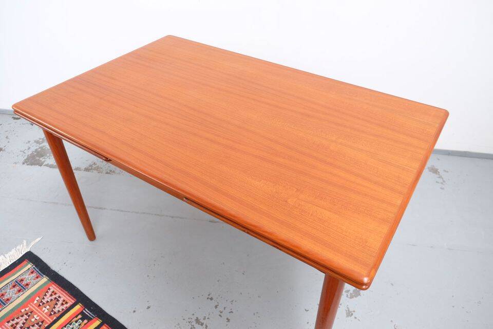 Teak dining table in retro vintage Danish style from the 60s-70s.