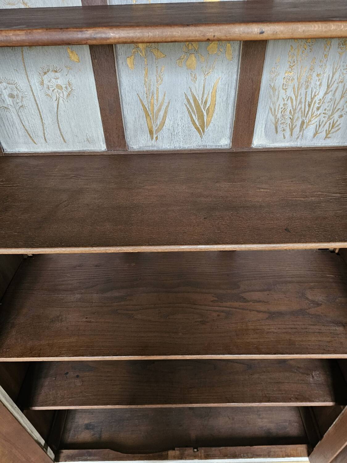 Antique bookcase with a white cerused patina