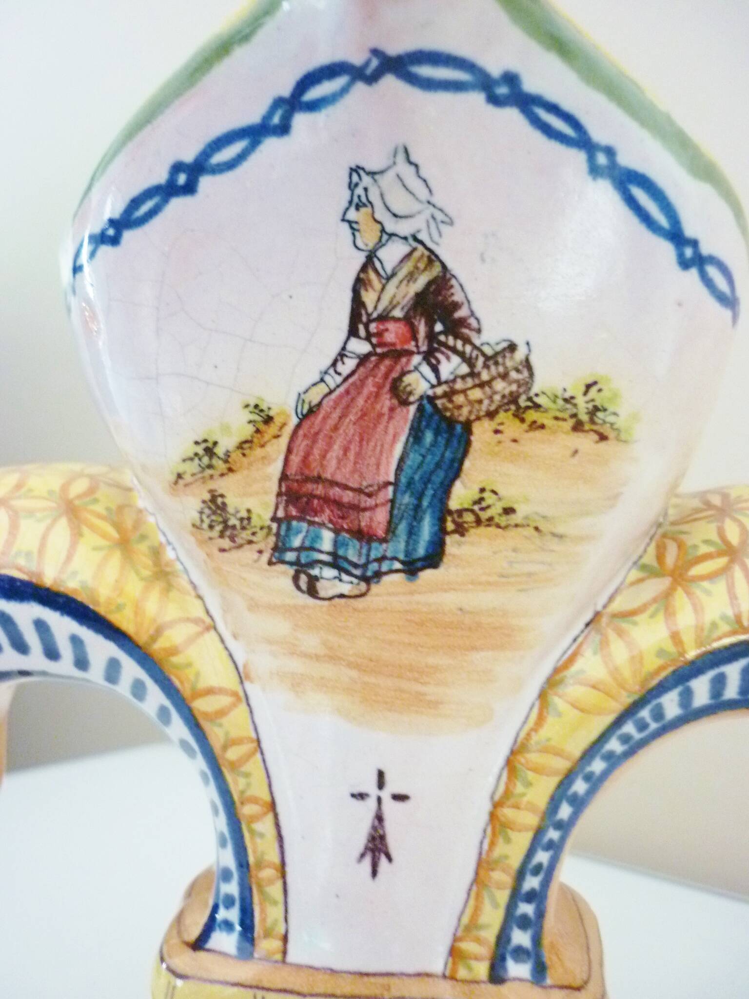 Fleur-de-lis shaped vase, glazed ceramic, Brittany, Quimper, Breton ermines, character