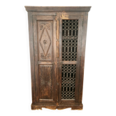 Massive hand-carved wooden cast iron grille colonial antique cupboard, Bali