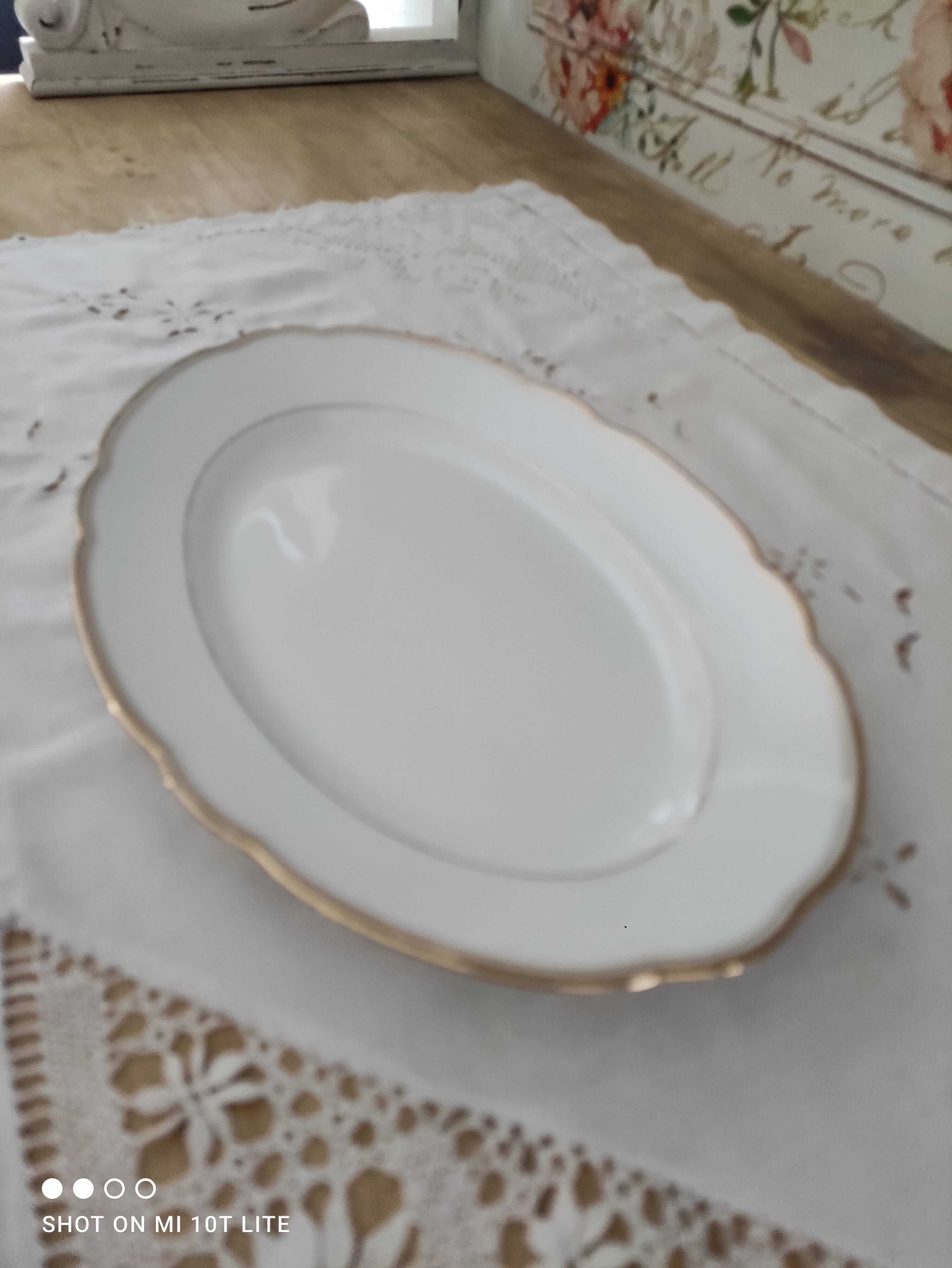 Oval plate in white Swiss porcelain double gilded border "VSK USC Viribus Unitis"