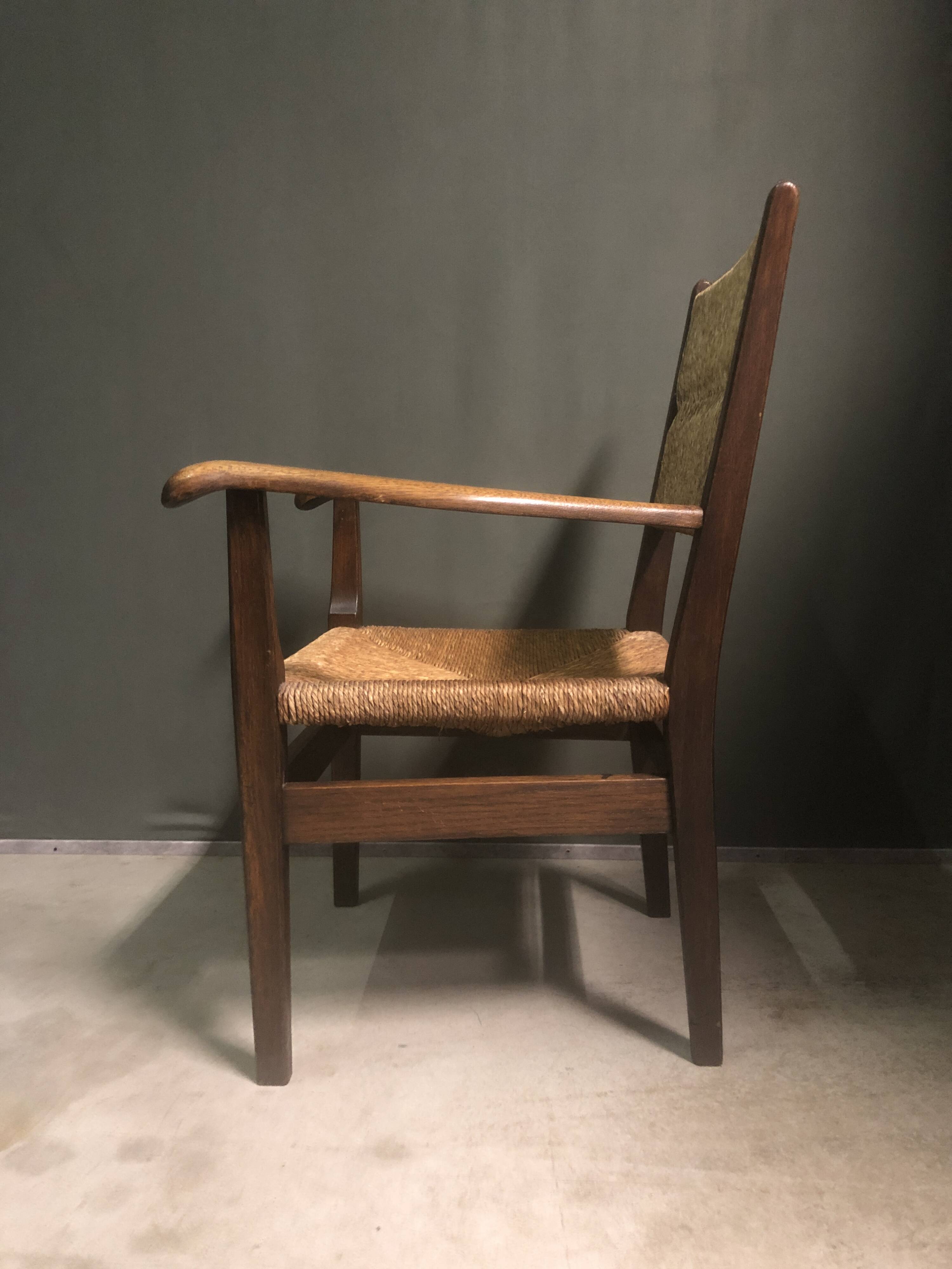 1930's Dutch oak and rush armchair.