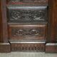Hand-carved commode from 1685 with sideboards and side cupboards.