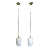Pair of opaline pendants from the 1960s, luminous simplicity, 140 cm.