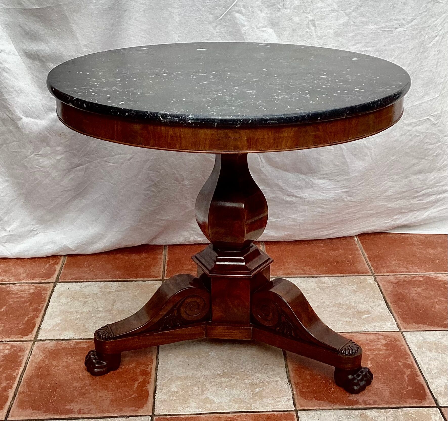 Old pedestal table in oak wood with marble