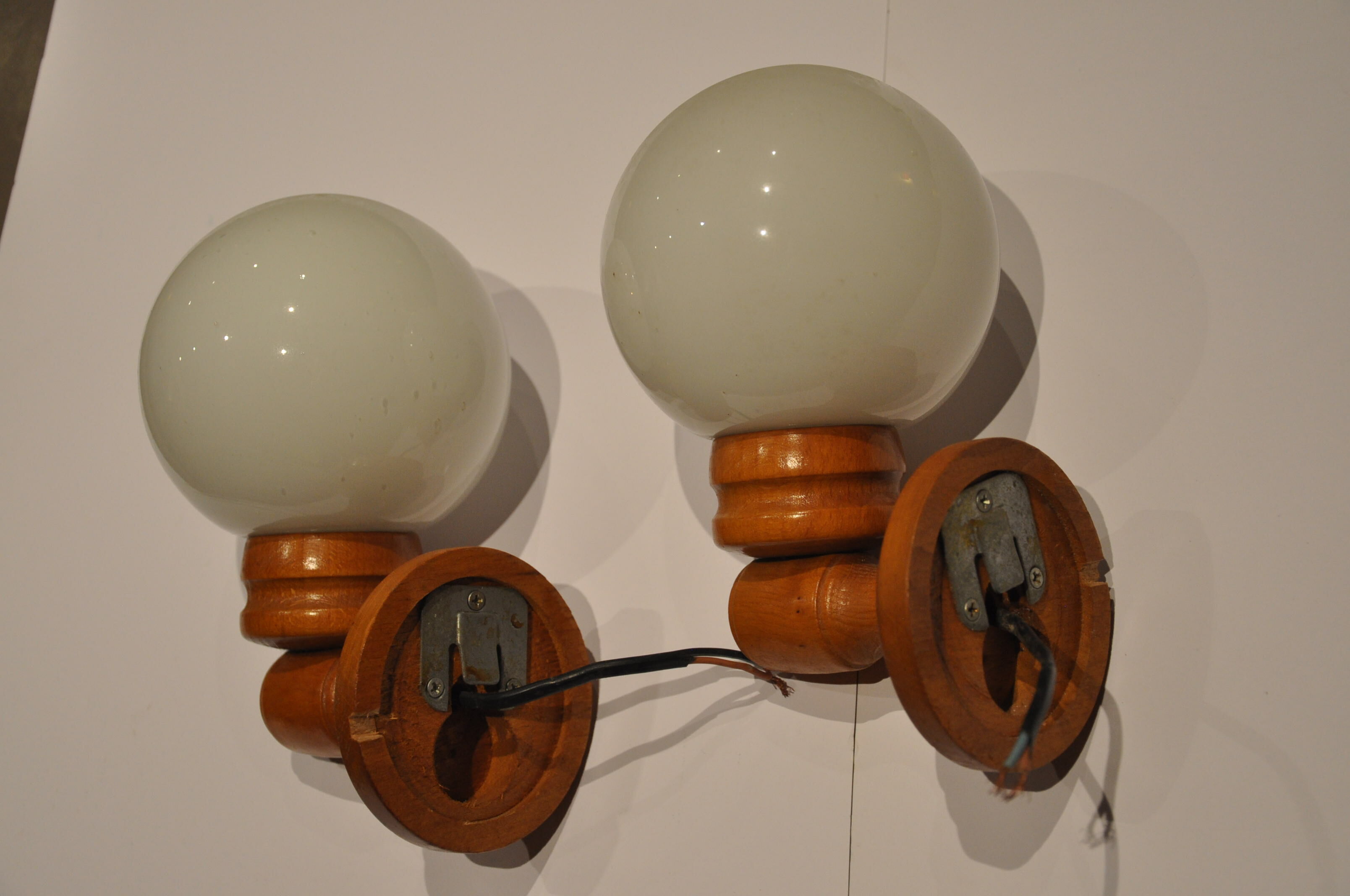 Duo of wooden wall light and glass globes