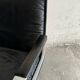 Wilkhahn Delta lounge chair in black leather with polished aluminum base and footrest (1970s)
