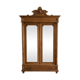 Antique wardrobe with 2 mirror doors in polished wood.