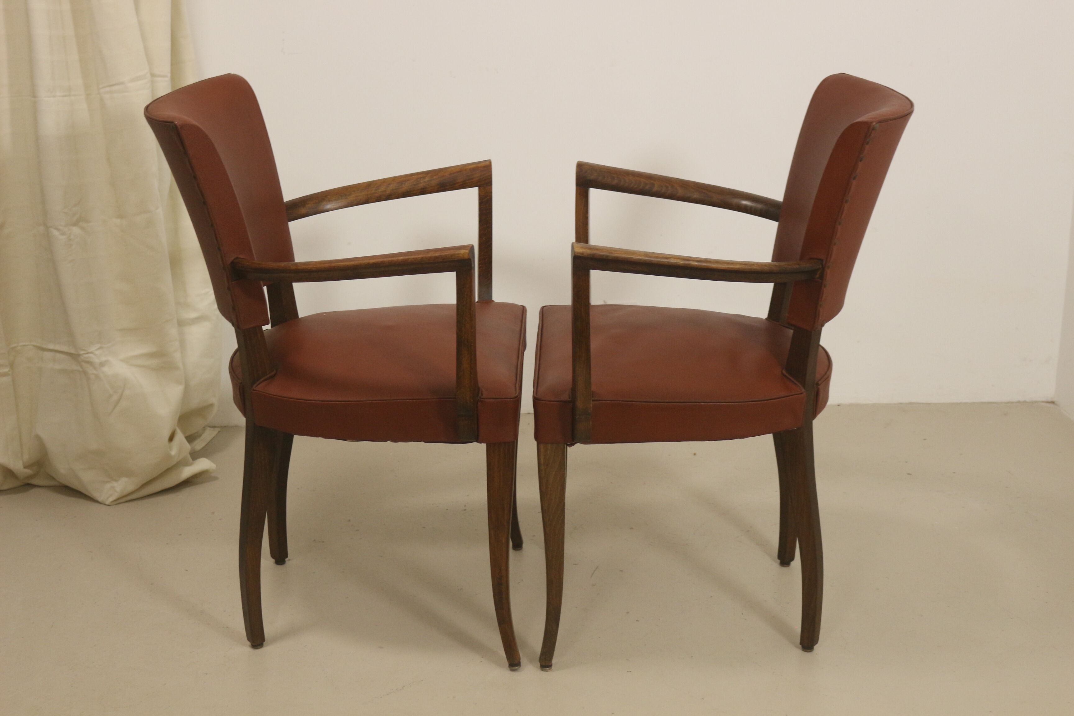 Pair of vintage bridge armchairs year 60 in imitation rust leather.