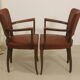 Pair of vintage bridge armchairs year 60 in imitation rust leather.