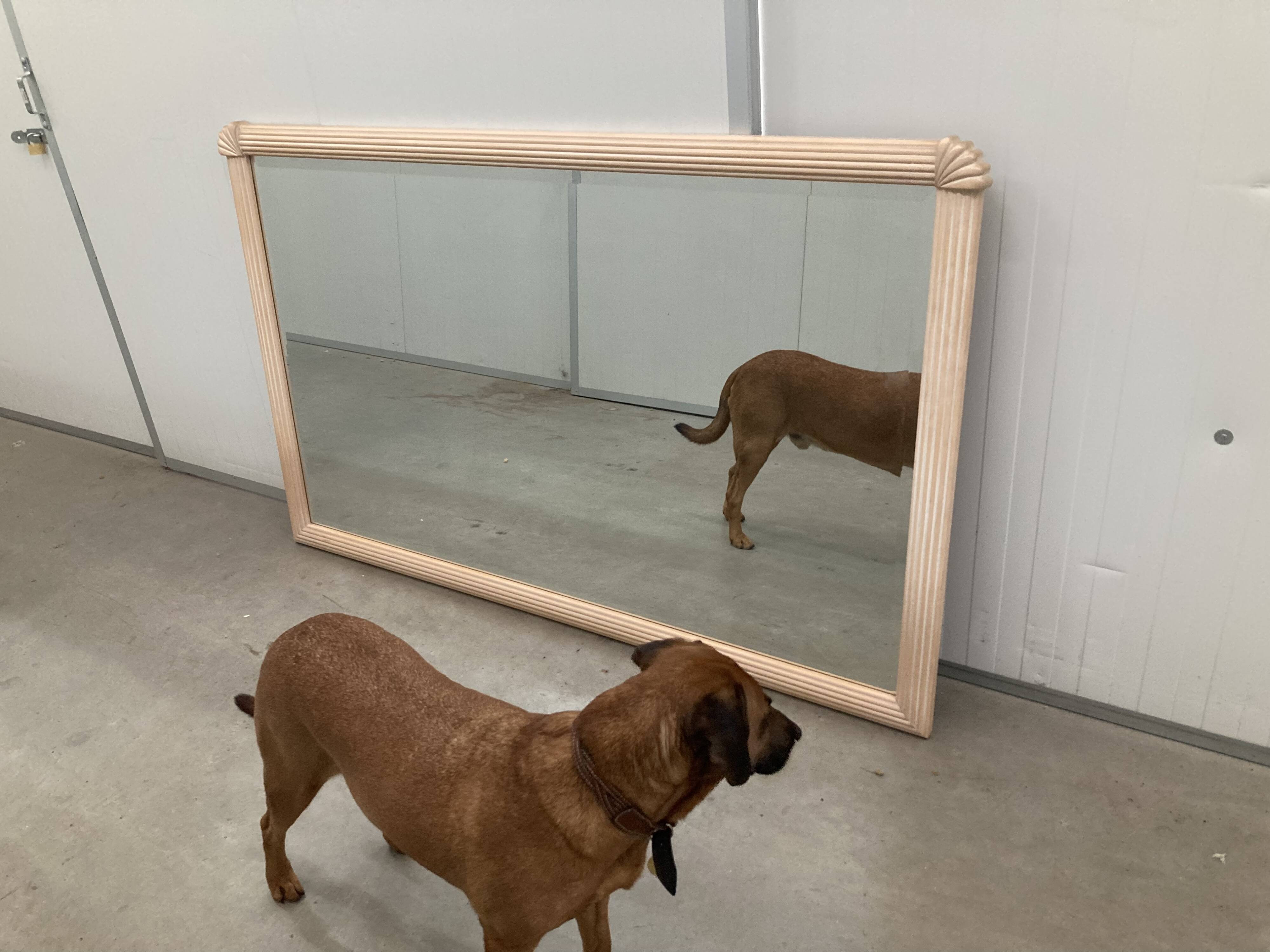 Vintage art deco mirror in salmon colour.