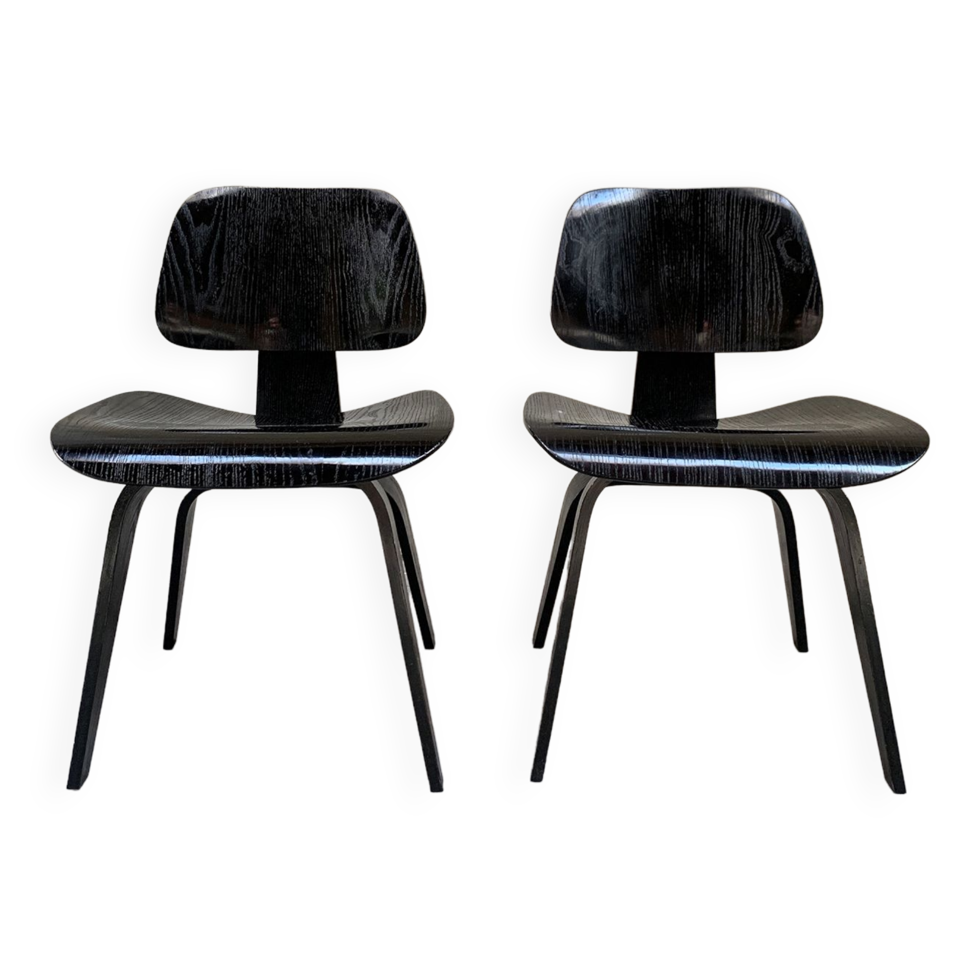 Pair of DCW chairs by Charles & Ray Eames in Black for Herman Miller 1950