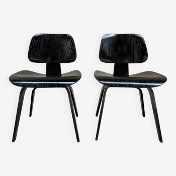 Pair of DCW chairs by Charles & Ray Eames in Black for Herman Miller 1950